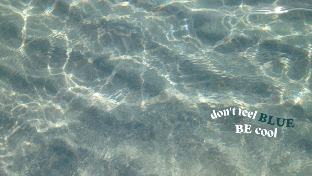 the crystal clear blue water of the sea is shining due to sunlight image