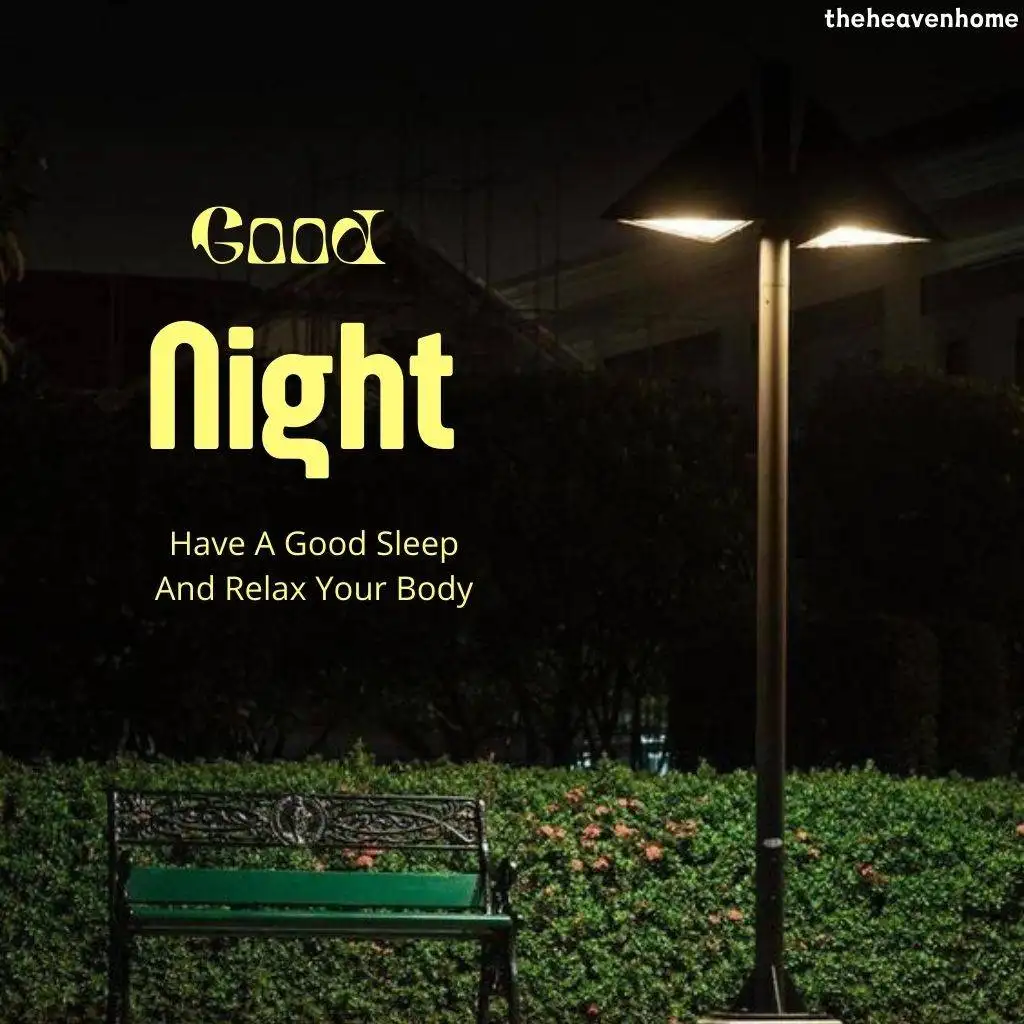 a park bench with a street light night image with a good night text