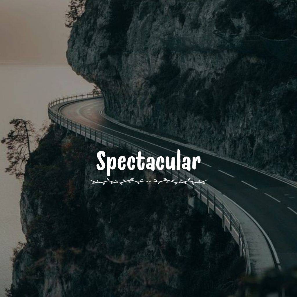 a highway in the dangerous mountain image with a quote word spectacular